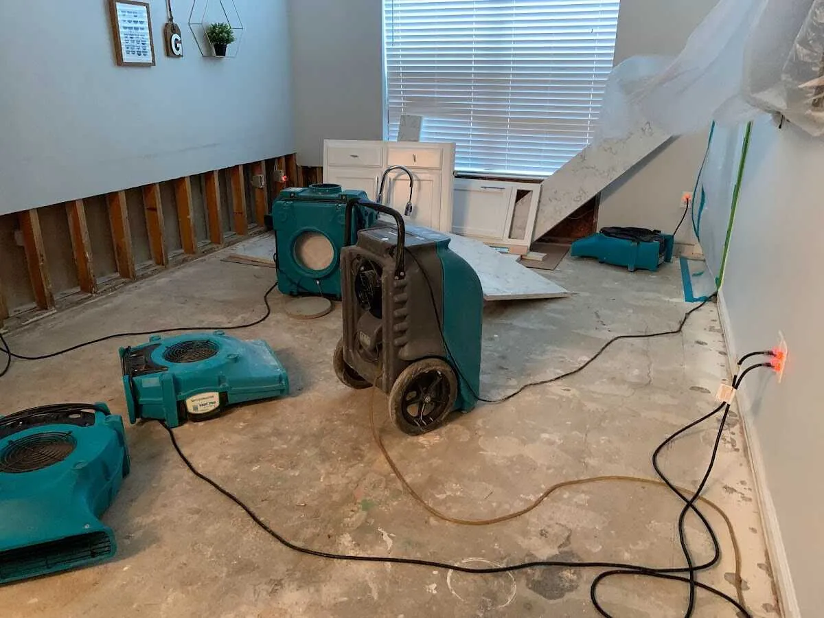 Dehumidifier in flood-cut room for Water Damage Restoration in Butler